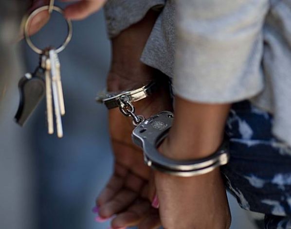 woman in handcuffs