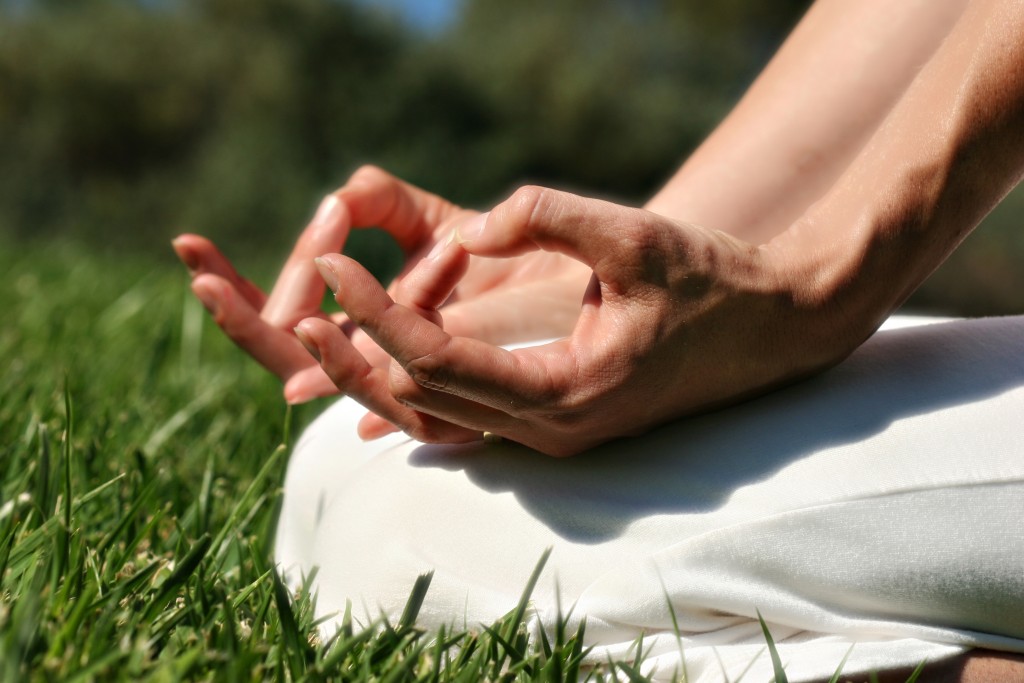 close up of hands during meditation