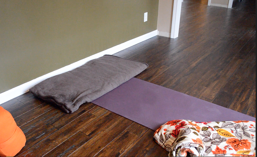 yin yoga supported reclined twist