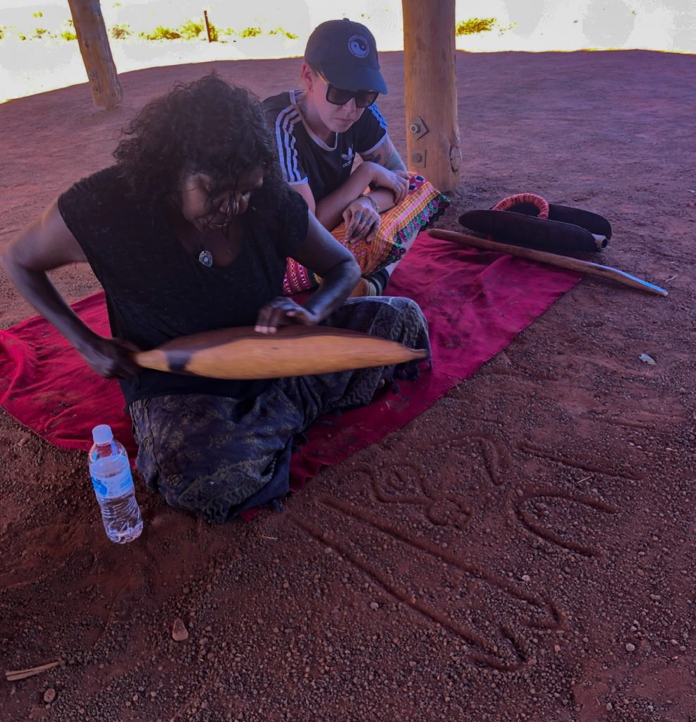 Uluru Anangu guide gives presentation near interpretive center